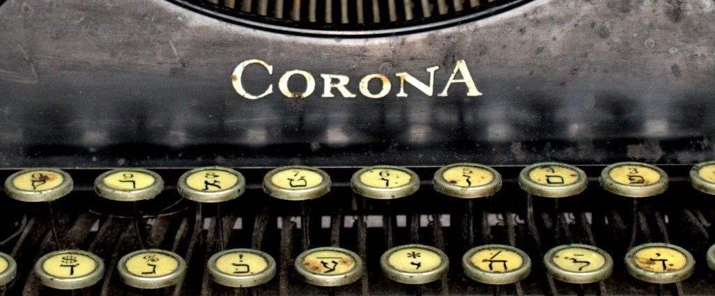 <p>Image via the <a href="https://jhsgh.org/corona-xc-r-yiddish-typewriter/">Jewish Historical Society of Greater Hartford</a></p>