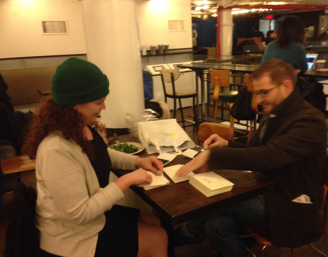 <p>President of the Board Eitan Kensky and Managing Editor Sarah Zarrow, hard at work preparing envelopes for thank-you cards, January 2016.</p>
