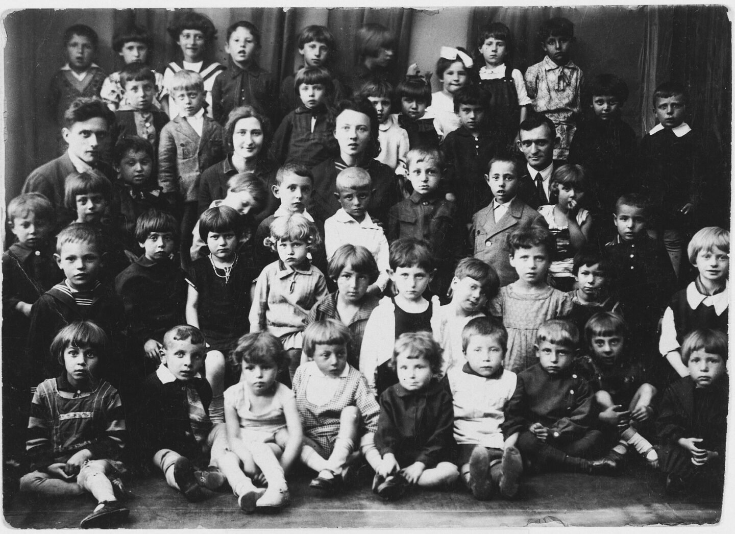 <p>Kindergarten children and teachers in the Medem Yiddish school in Kalisz, 1929 (USHMM).</p>