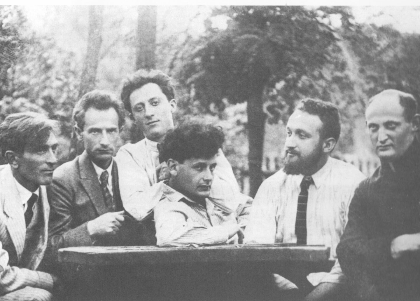 <p><em>Mener</em> conference attendees gossiping about lady scholars outside the men’s room, because they definitely have nothing better to talk about.</p>
