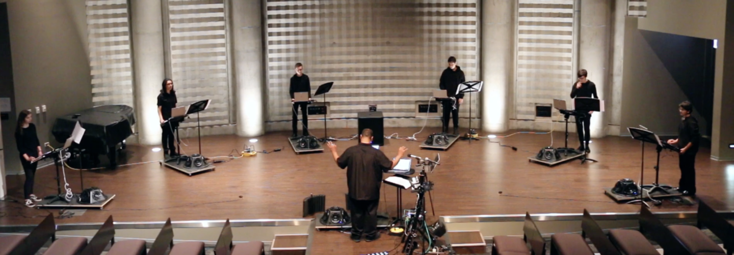 <p>Francisco Dean conducts the Chicago Lab School’s Electronic Orchestra in a performance of <em>Frilingdik Umbazigt: As the Spring Unconquered</em></p>