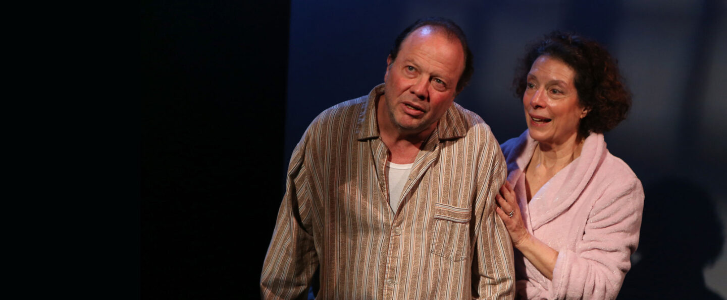 <p>Avi Hoffman and Suzanne Toren as Willy and Linda Loman in <em>Death of a Salesman</em> at New Yiddish Rep. (Photo: Ronald L. Glassman)</p>