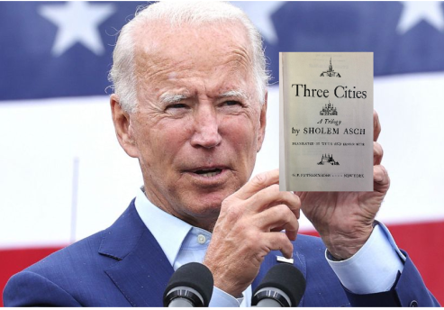 <p>President Biden poses with his favorite Sholem Asch novel.</p>